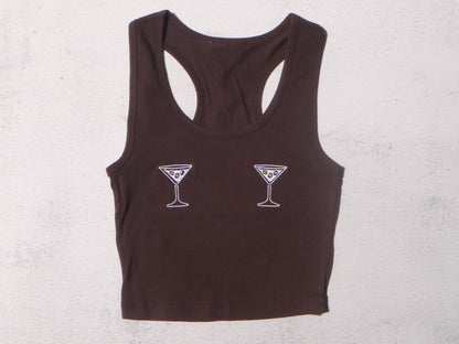 Brown tank top with martini glass designs on a light gray background